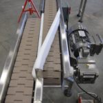 Side transfer table-top conveyor